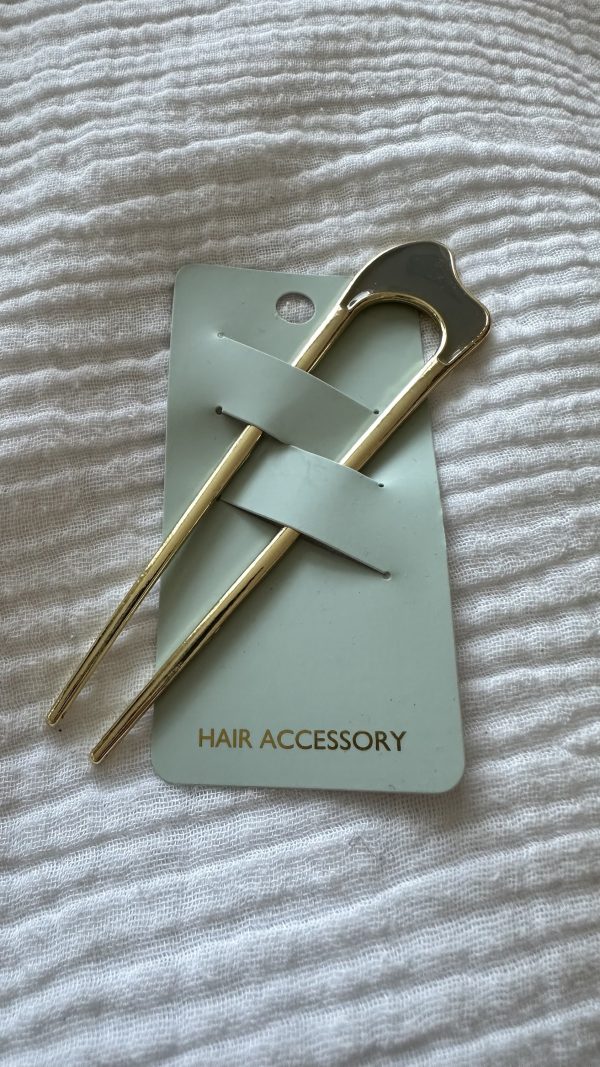 Gray and brass hair pin